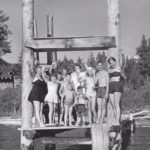 Historical photo of children on dock